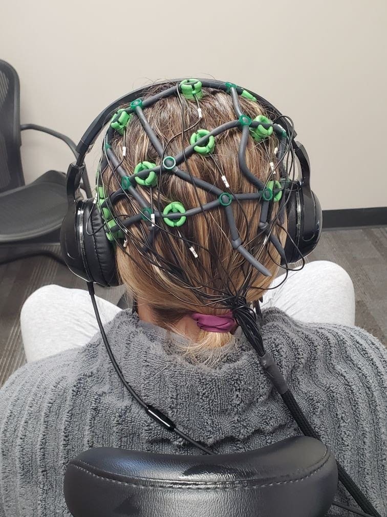 Woman getting Neurofeedback Therapy at Peak Brain Centers patient getting neuorfeedback therapy at Peak Brain Centers