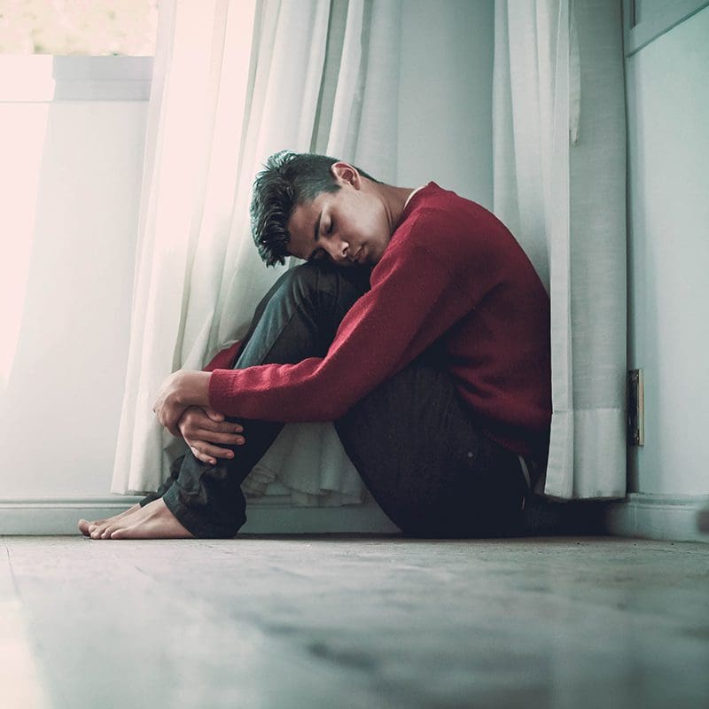 man sitting on the ground wanting help man sitting on the ground wanting help